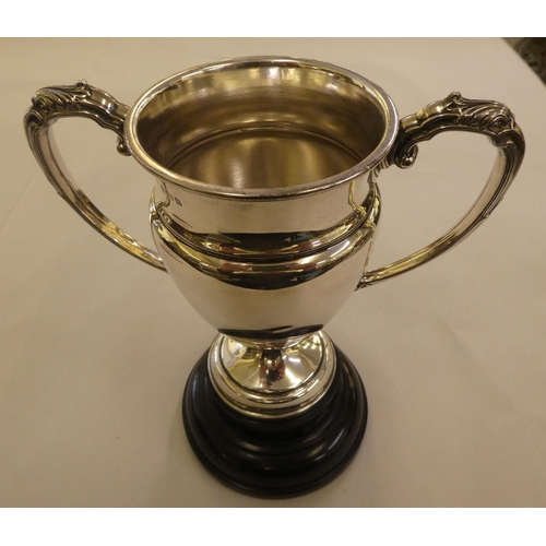 145 - A silver twin handled trophy cup  Birmingham 1929  5.5