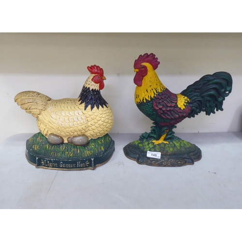 148 - Two cast iron door porters, a chicken  11