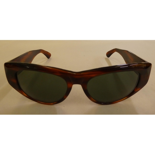 151 - Sunglasses, viz. a pair of Ray-Ban in brown simulated tortoiseshell, in protective cover; and a pair... 