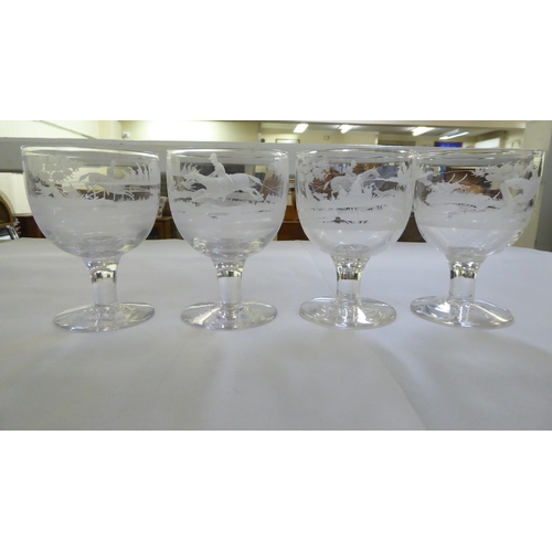 155 - A set of eight pedestal wine glasses, engraved with hunting scenes  5