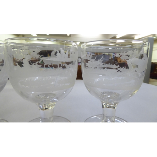 155 - A set of eight pedestal wine glasses, engraved with hunting scenes  5