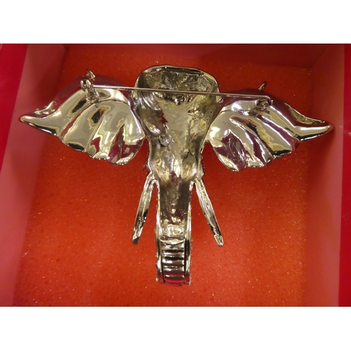 156 - Paste jewellery: to include a Butler & Wilson oversize elephant head brooch; a similar bee; and ... 