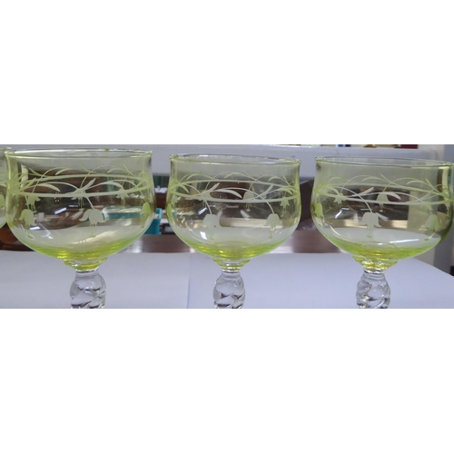 158 - A set of Art Nouveau light green shaded pedestal wine glasses  7.5