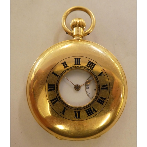 162 - An early 20thC 18ct gold cased half hunter pocket watch, the movement faced by an enamelled Roman di... 