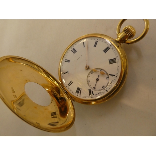 162 - An early 20thC 18ct gold cased half hunter pocket watch, the movement faced by an enamelled Roman di... 