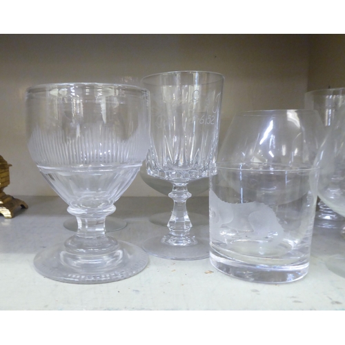 168 - Glassware: to include a set of five brandy balloons, engraved with wild fowl 