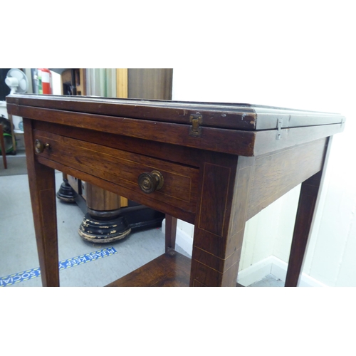 180 - An Edwardian marquetry inlaid rosewood envelope card table with a frieze drawer, raised on square, t... 