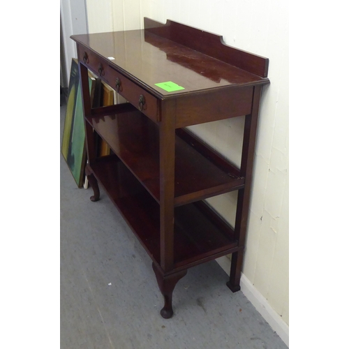 203 - An Edwardian three tier buffet with two drawers, raised on cabriole legs&nbsp; 42