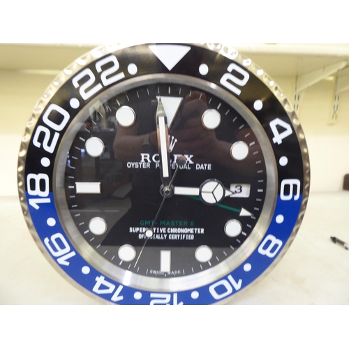 205 - A Rolex Oyster Quartz dealers display wall clock&nbsp; no.A6409&nbsp; 13.5