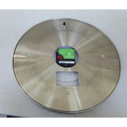 205 - A Rolex Oyster Quartz dealers display wall clock&nbsp; no.A6409&nbsp; 13.5