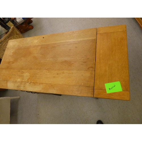 207 - A modern oak single pedestal desk with four drawers, raised on block legs&nbsp; 29