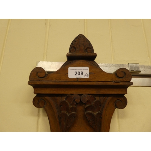 208 - A mixed lot: to include an Edwardian oak barometer with a Roman and Arabic dial&nbsp; 34