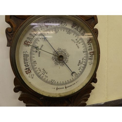 208 - A mixed lot: to include an Edwardian oak barometer with a Roman and Arabic dial&nbsp; 34