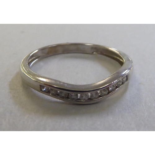210 - A 9ct white gold diamond set wedding ring&nbsp;&nbsp;