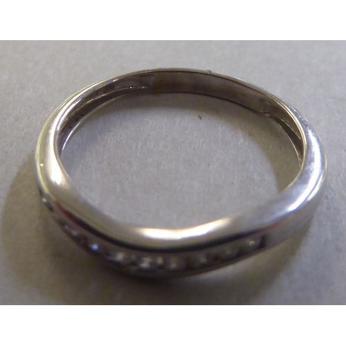 210 - A 9ct white gold diamond set wedding ring&nbsp;&nbsp;