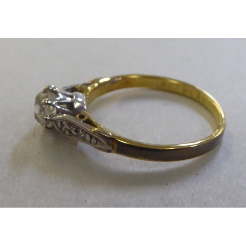 215 - An 18ct gold and platinum diamond solitaire ring&nbsp;
