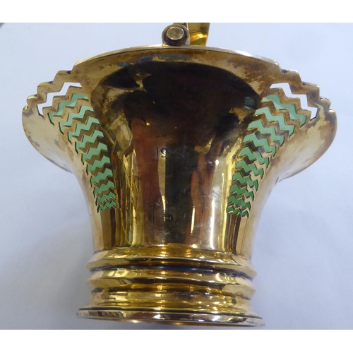 221 - A Mappin & Webb silver sugar basket with a green glass liner and matching spoon&nbsp; Sheffield ... 