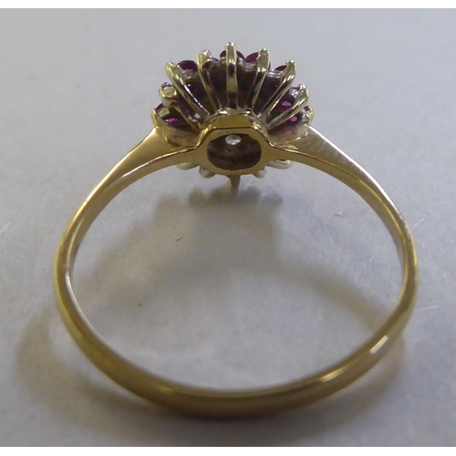 225 - A 9ct gold ruby and diamond cluster ring&nbsp;