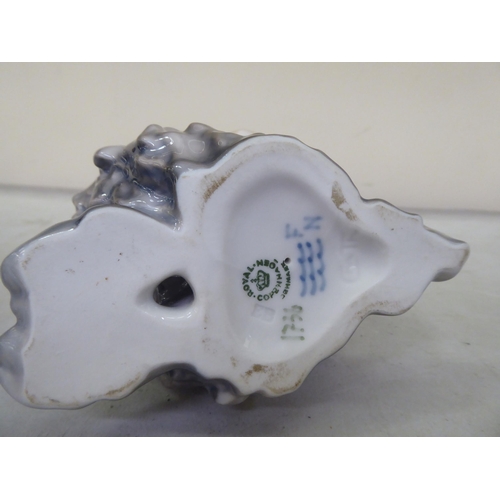 226 - Royal Copenhagen porcelain collectables: to include a dog  no.3170  3.5