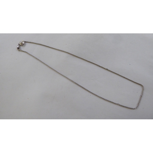 229 - An 18ct white gold diamond pendant necklace
