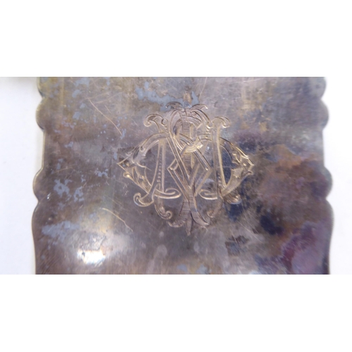 231 - Silver collectables: to include an early 20thC card case with a hinged lid&nbsp; Birmingham 1911&nbs... 