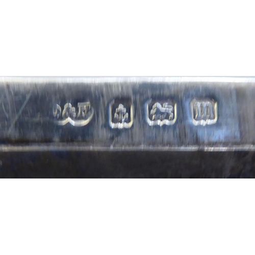 231 - Silver collectables: to include an early 20thC card case with a hinged lid&nbsp; Birmingham 1911&nbs... 