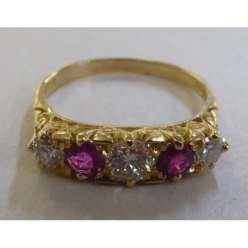 235 - An 18ct gold diamond and ruby ring&nbsp;