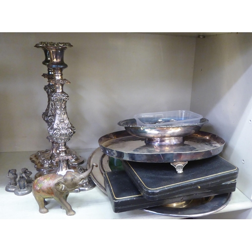 236 - Metalware: to include a pair of silver plated candlesticks, embossed with swags  8