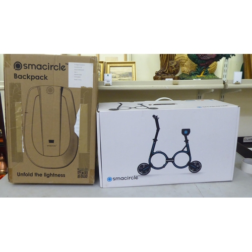 238 - A Smacycle S1 folding electric bicycle and back pack  boxed