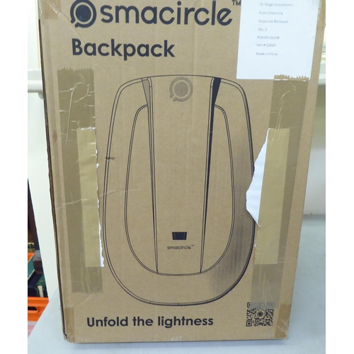 238 - A Smacycle S1 folding electric bicycle and back pack  boxed