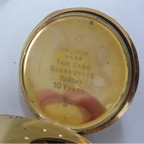 239 - A mixed lot: to include a gold plated pocket watch, the movement faced by a Roman dial&nbsp;