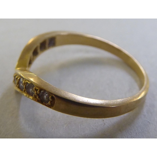 240 - An 18ct gold wishbone design diamond set ring&nbsp;