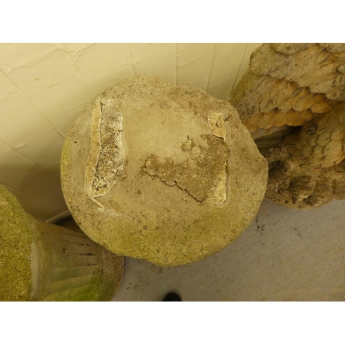241 - A pair of late 1950s composition stone grotesque birds on separate stone columns  69