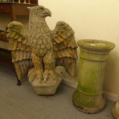 241 - A pair of late 1950s composition stone grotesque birds on separate stone columns  69