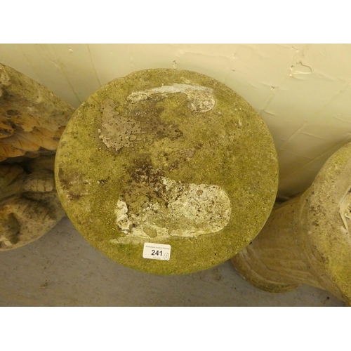 241 - A pair of late 1950s composition stone grotesque birds on separate stone columns  69