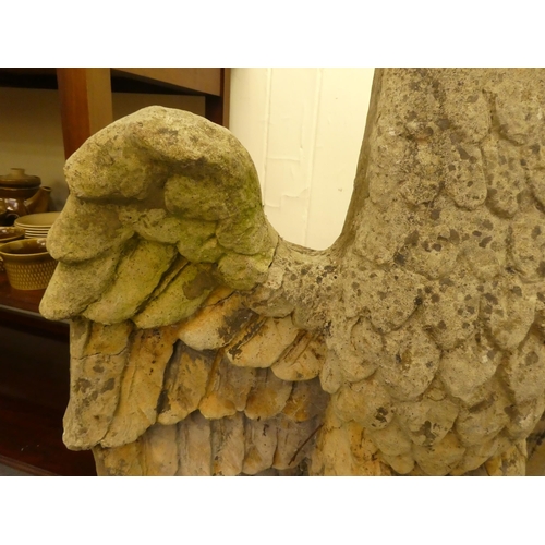 241 - A pair of late 1950s composition stone grotesque birds on separate stone columns  69