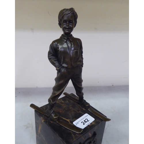 242 - After Johann Ferdinind Preiss bronze 'Ski-Boy'  on a marble plinth  11