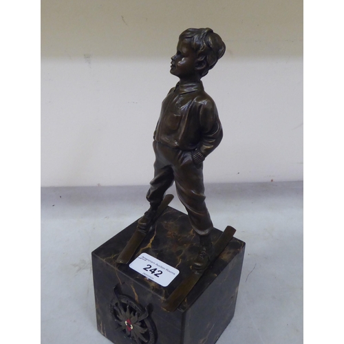 242 - After Johann Ferdinind Preiss bronze 'Ski-Boy'  on a marble plinth  11