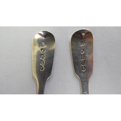 259 - Silver spoons: to include a Georgian caddy spoon  indistinct marks 