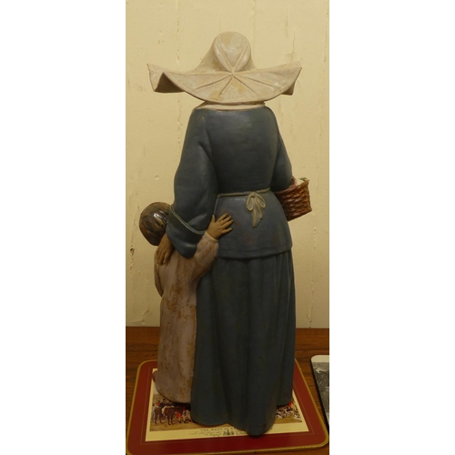 263 - A Lladro porcelain group, a nun and child  16