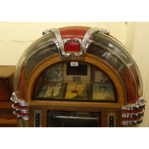 266 - An American design wood finished compact disc juke box  60