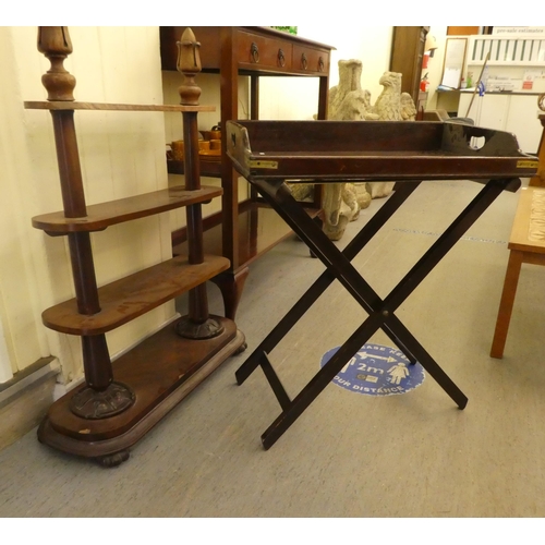 269 - Small furniture: to include a William IV mahogany, three tier what-not, raised on bun feet  40