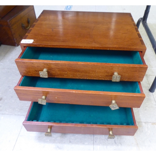 275 - A modern Chinese teak, four drawer canteen chest (empty), raised on bracket feet  12