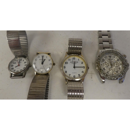 29 - Variously cased and strapped ladies and gents wristwatches