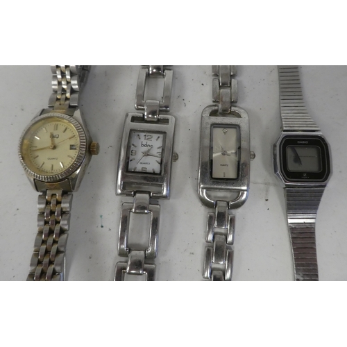 29 - Variously cased and strapped ladies and gents wristwatches