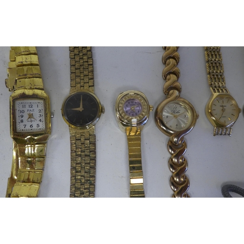 29 - Variously cased and strapped ladies and gents wristwatches