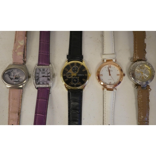 29 - Variously cased and strapped ladies and gents wristwatches