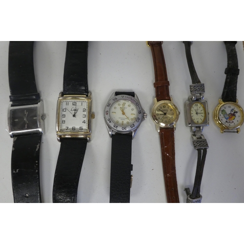 29 - Variously cased and strapped ladies and gents wristwatches