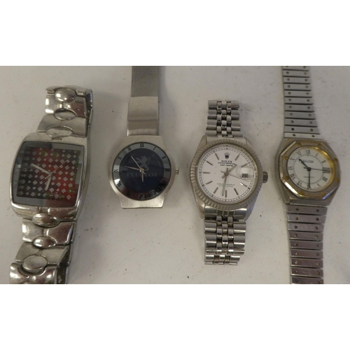 29 - Variously cased and strapped ladies and gents wristwatches