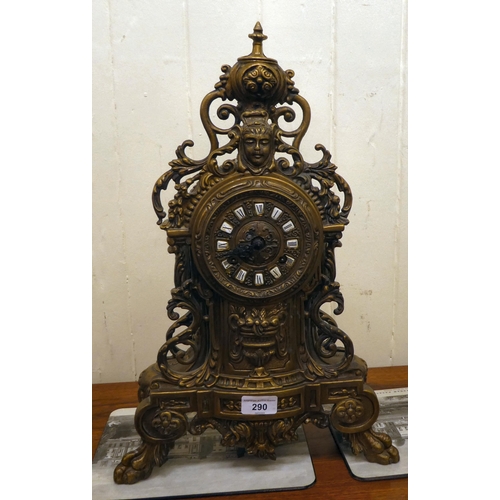 290 - A modern Victorian design, gilt metal cased mantel clock of ornate architectural design, faced by a ... 